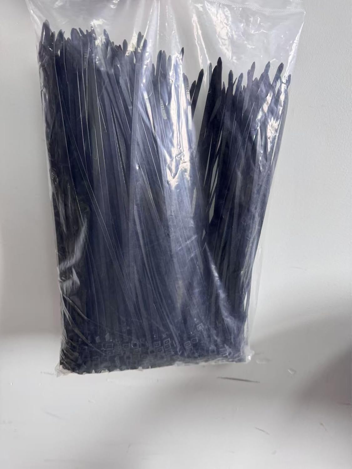 XINGO 1000 PCS Black Zip Ties 12 Inch, 60 LBS Tensile Strength, Self-Locking Nylon Plastic Nylon PA66 Wire Ties for Indoor and Outdoor Use